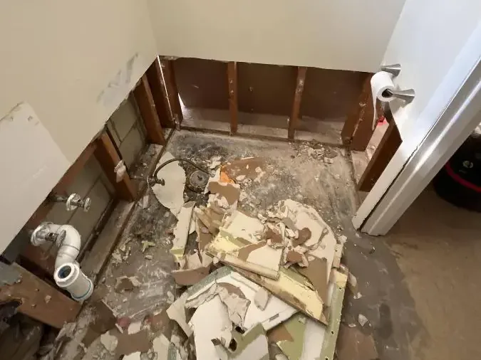 Bathroom stripped to the studs during a sewage cleanup