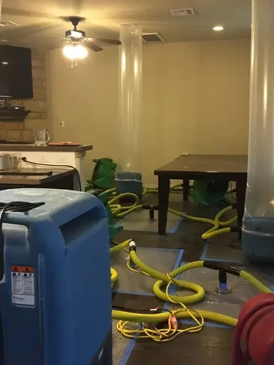 Truck-mounted water extraction gear set up on a job